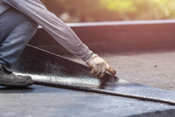 Professional Basement Waterproofing technician working in Glen Cove, NY